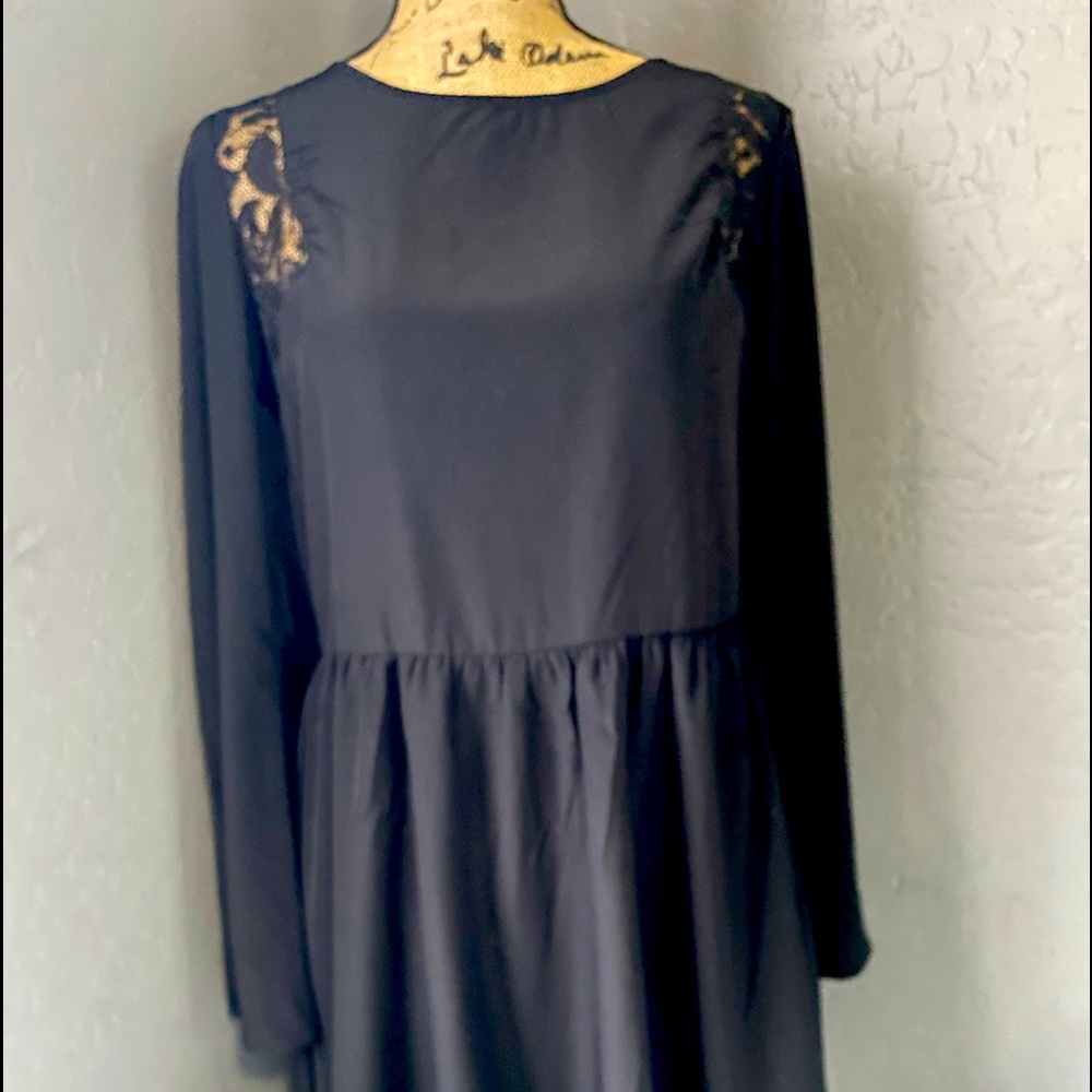 Junior Black Dress with a bell long sleeve